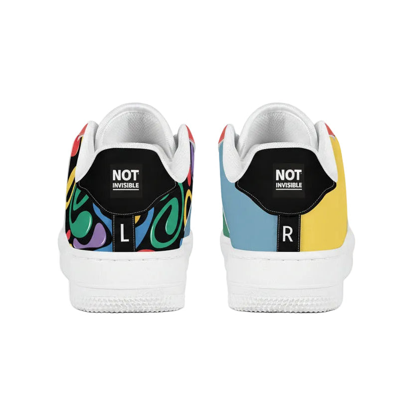 Colorful sneakers with 'NOT Invisible' text on a white background
